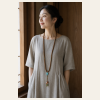 Earthwood Accent Mala — young East Asian woman styling view
