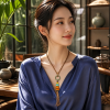 Five-Tone Stacked-Bead Pendant — young East Asian woman styling view Five-Tone Stacked-Bead Pendant — young East Asian woman styling view