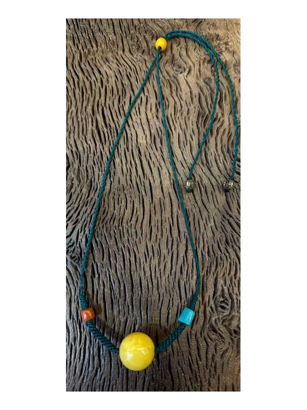 Golden Orb Cord Necklace — faithful square product view