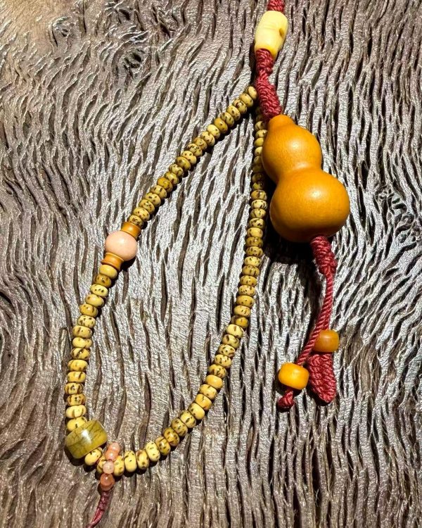 Gourd Fortune Charm — close product detail Gourd Fortune Charm — close product detail