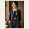 Pearl & Pattern Long Necklace — young East Asian woman styling view Pearl & Pattern Long Necklace — young East Asian woman styling view