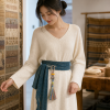 Rainbow Tassel Knot Charm — young East Asian woman styling view