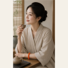 Sunset Round-Bead Bracelet — young East Asian woman styling view